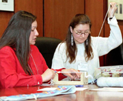 Students in a workshop on using beadwork to teach mathematics.