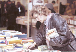 Photo of a person browsing at the book sale