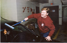 Photo of Bill Curran washing a car