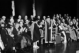 Dr. Rita Shane, who was the only woman in the first graduating class of Sir George Williams University in 1937, accepts her honorary certificate from outgoing President Frederick Lowy. The handful of students in Dr. Shane’s class were called the Guinea Pigs, because as the first SGW university students, they were considered to be part of an experiment.