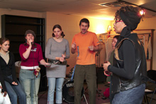 Photo of Jeri Brown rehearses with her vocal jazz students.